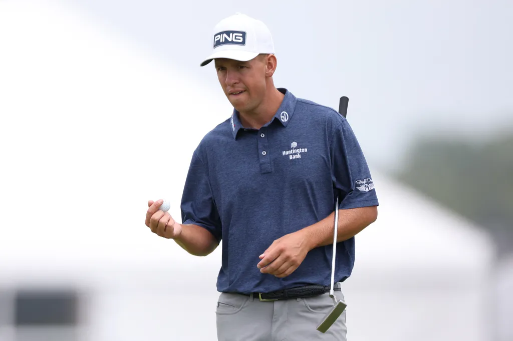 Sam Stevens preparing to putt during the first round of the U.S. Open golf tournament.