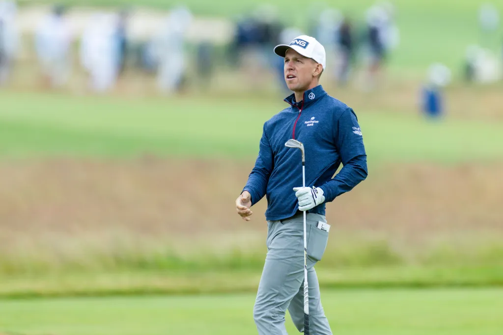 Golfer Sam Stevens watches his approach shot during the 126th U.S. Open Golf Championship.