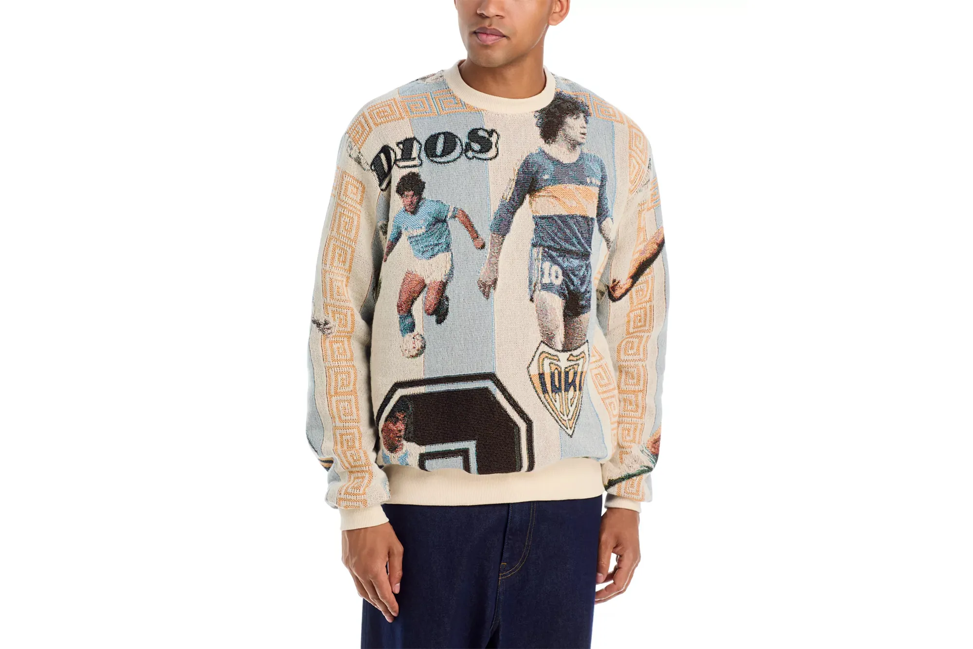 Model wearing a tapestry sweater depicting football player Diego Maradona in various jerseys and a "DIOS" graphic.
