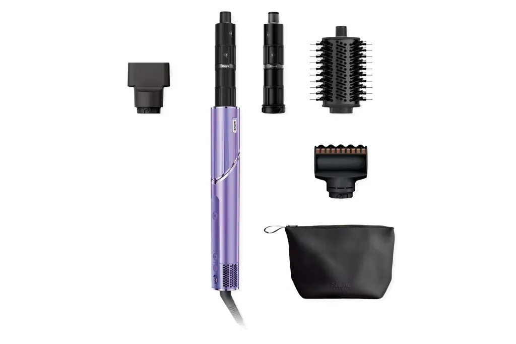 Shark purple hair styling tool with multiple attachments and a carrying case.