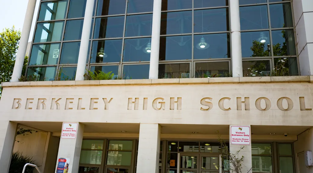 Facade of Berkeley High School with "Berkeley High School" carved above its entrance.