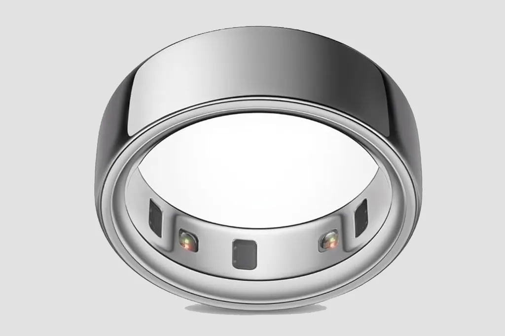 Illustration of a silver-colored smart ring with sensors on the inside.