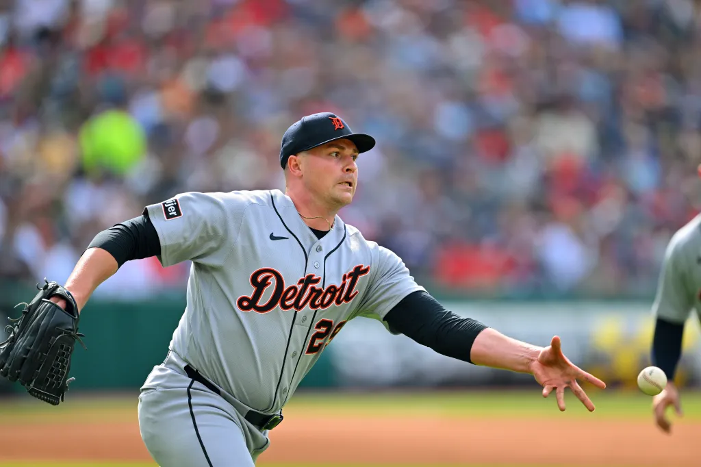Detroit Tigers pitcher Tarik Skubal throwing to first base.