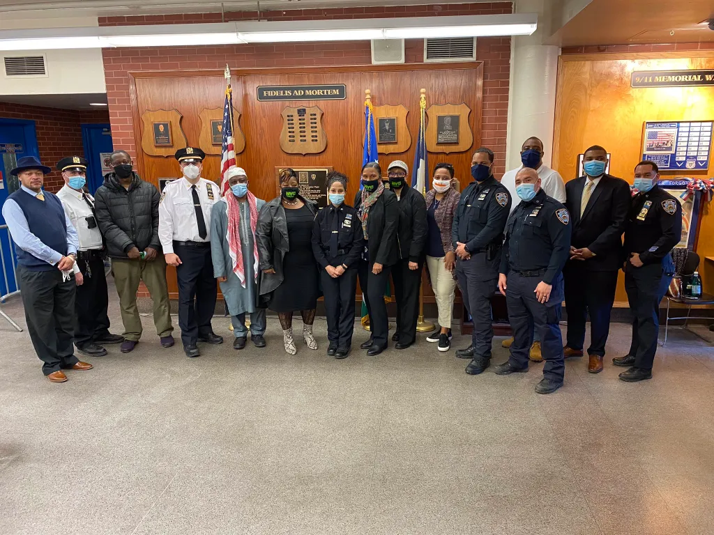 Adams, far right, worked for the Community Affairs Bureau. 