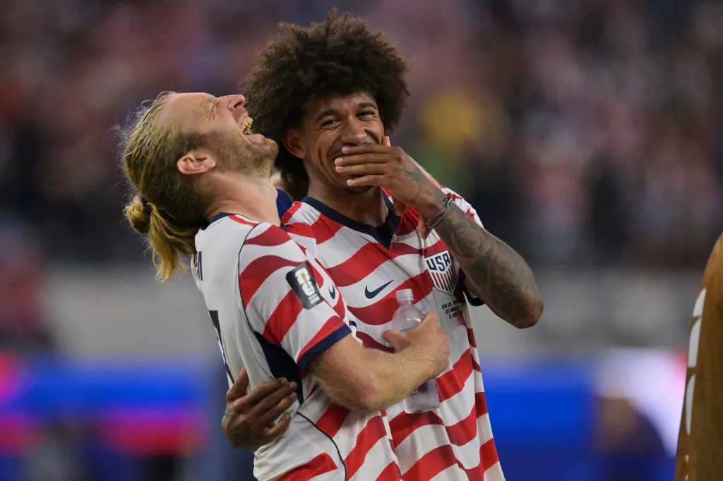 US soccer players Tim Ream and Chris Richards celebrating a victory.