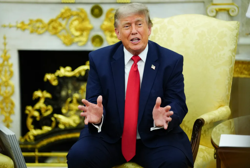 President Donald Trump speaking during a meeting at the White House.