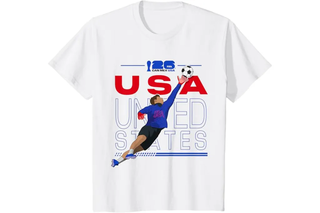 Illustration of a white t-shirt with a graphic of a soccer player reaching for a ball, with "USA United States" in red and blue text.