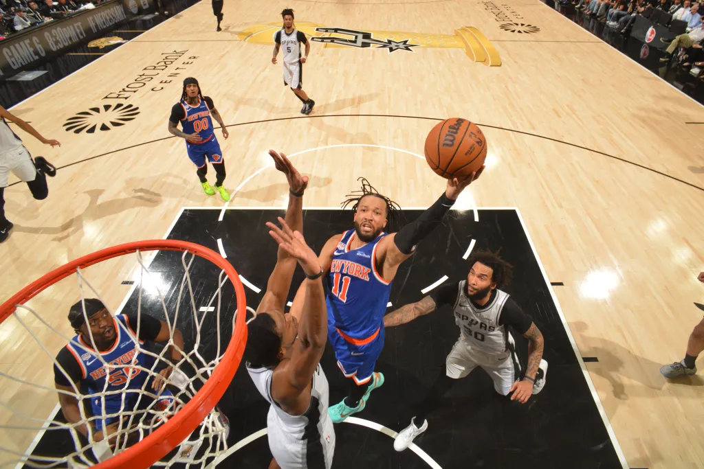 Jalen Brunson drives to the basket for a layup in the fourth quarter of the Knicks' Game 5 win over the Spurs to claim the NBA championship.