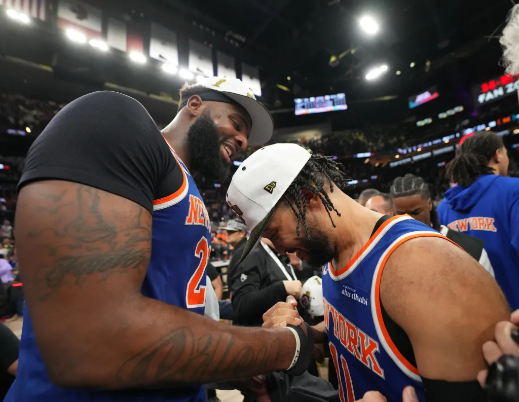 New York Knicks players Mitchell Robinson and Jalen Brunson celebrate during the 2026 NBA Finals.