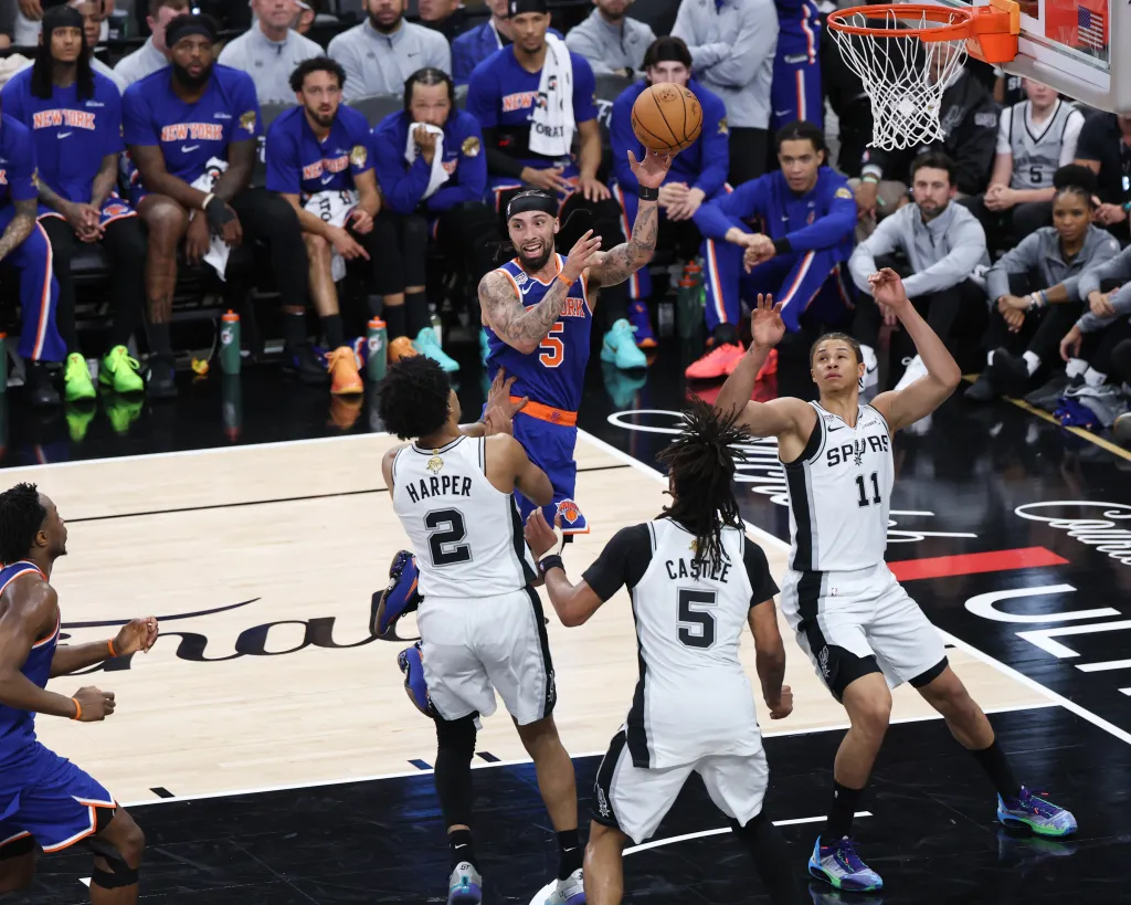 Jose Alvarado of the New York Knicks looks to pass the ball during Game Five of the 2026 NBA Finals.