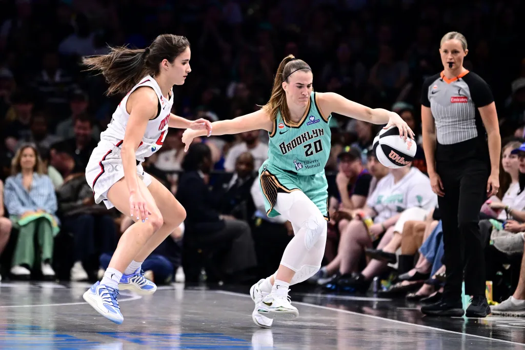 Sabrina Ionescu #20 of the New York Liberty handles the ball during the game against the Washington Mystics during the WNBA Commissioner's Cup on June 14, 2026 at Barclays Center Arena in Brooklyn, New York.