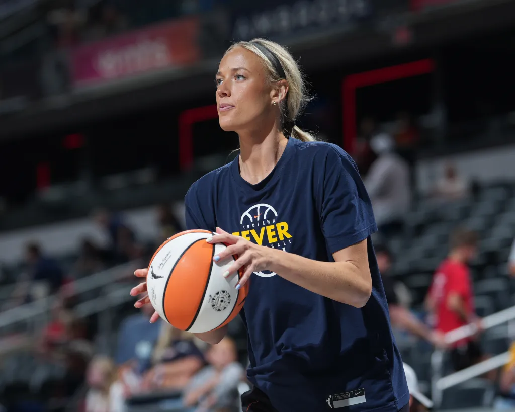 Sophie Cunningham warms up with a basketball.