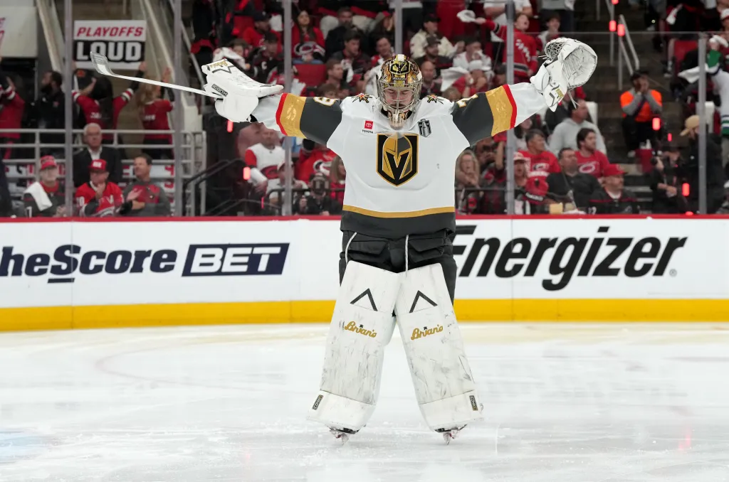 Vegas Golden Knights goalie Carter Hart (79) warms up with arms outstretched on the ice during the Stanley Cup Final.