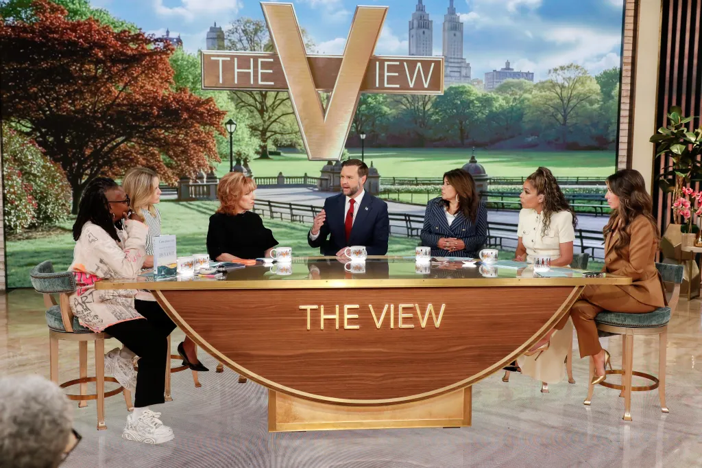 The View co-hosts and guest JD Vance sitting around a curved desk.