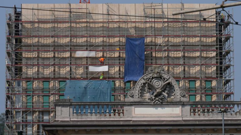 Foreign workers say they were paid less than $2 an hour to build a new US Consulate