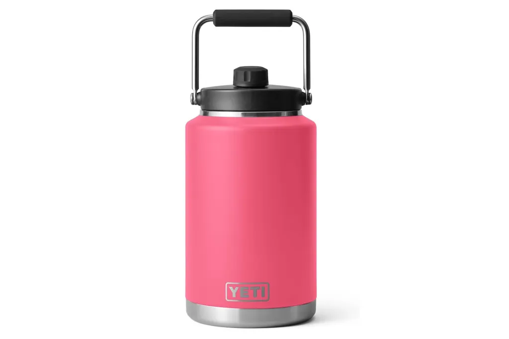 Pink Yeti Rambler with a black handle and lid.