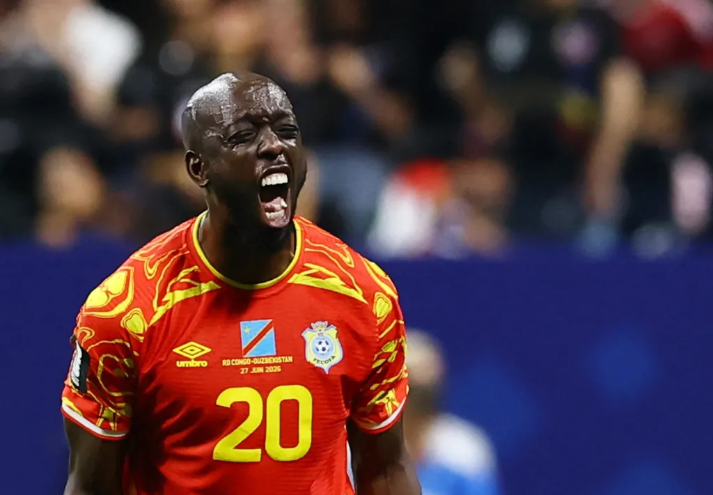 DR Congo's Yoane Wissa celebrates Fiston Mayele's second goal.