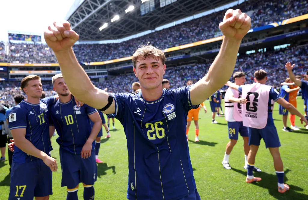 Ermin Mahmic celebrates after Bosnia-Herzegovina's win over Qatar on June 24, 2026 in Seattle.