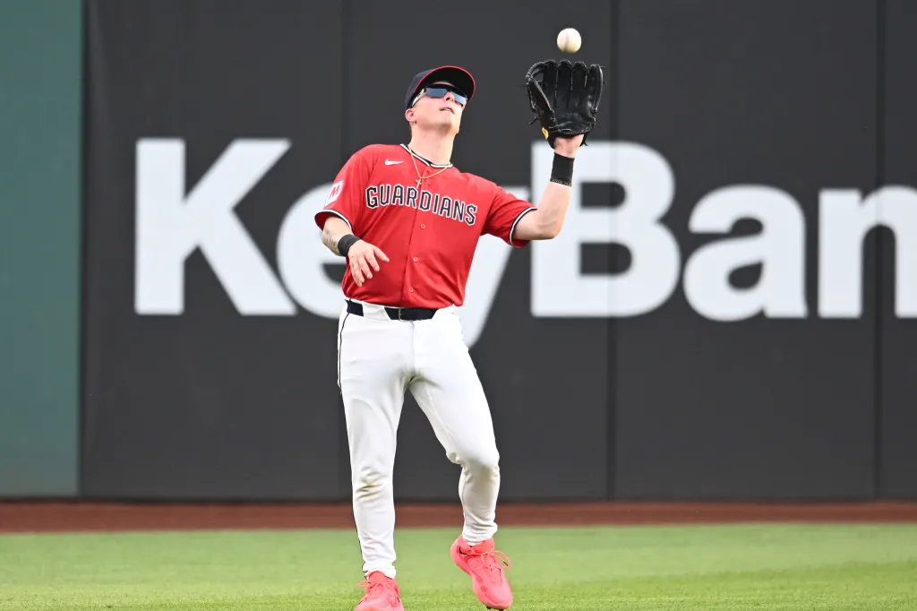 Cleveland Guardians left fielder Cooper Ingle (30) catches a ball hit by Texas Rangers left fielder Alejandro Osuna (not pictured) during the seventh inning at Progressive Field. 