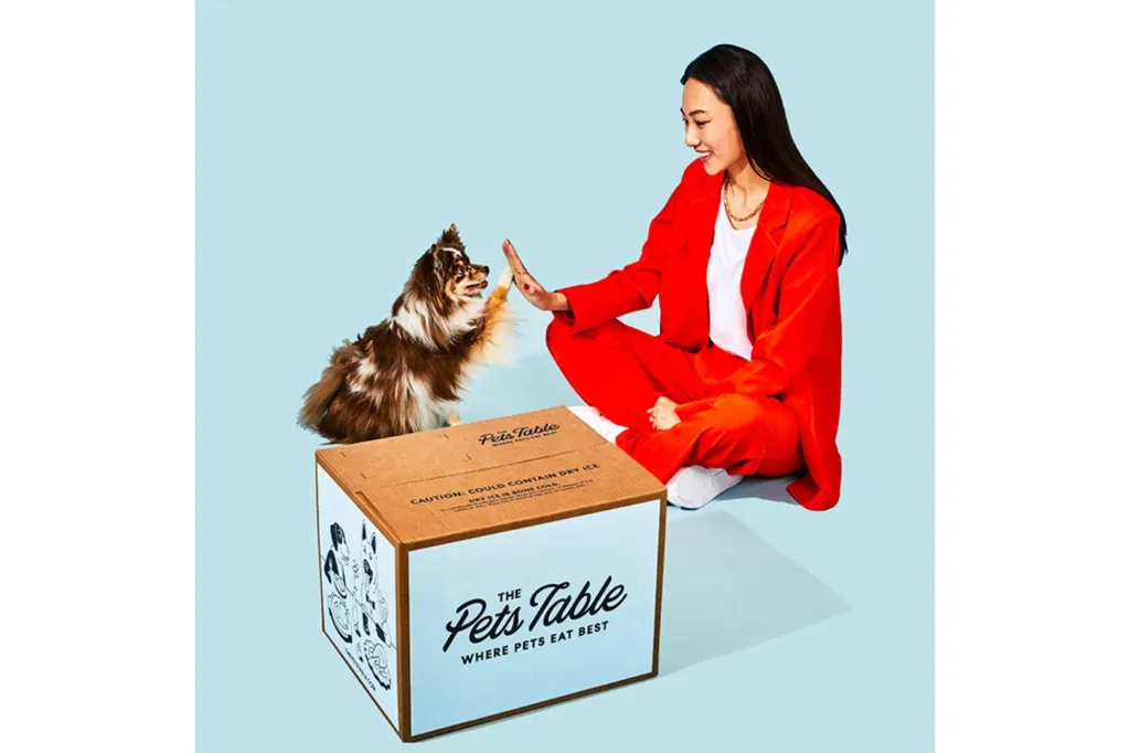 ThePetsTable with aowman and dog
