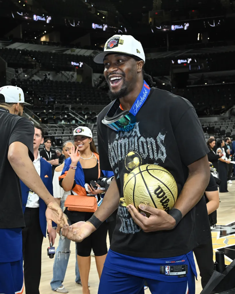 Ariel Hukporti celebrates after the Knicks win the NBA championship.